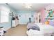 Bright bedroom with light blue walls, white dresser, and comfortable bed at 4815 Sugar And Wine Rd, Monroe, NC 28110