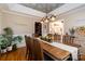 Bright dining room featuring a farmhouse table and access to the kitchen at 4815 Sugar And Wine Rd, Monroe, NC 28110