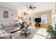 Sun-drenched living room featuring hardwood floors and a cozy seating area at 4815 Sugar And Wine Rd, Monroe, NC 28110