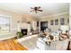 Spacious living room with fireplace, hardwood floors, and lots of natural light at 4815 Sugar And Wine Rd, Monroe, NC 28110