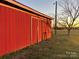 Red storage barn with double doors at 4815 Sugar And Wine Rd, Monroe, NC 28110