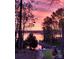 Picturesque waterfront view featuring a private dock and serene water, perfect for enjoying peaceful lakeside living at 9542 Riviera Dr, Sherrills Ford, NC 28673