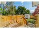 Wooden deck and steps leading to a small backyard at 119 Nat Barber Ave, Gastonia, NC 28052