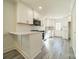 Newly remodeled kitchen featuring white cabinets and quartz countertops at 119 Nat Barber Ave, Gastonia, NC 28052