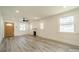 Living room with hardwood floors and a view into the kitchen at 119 Nat Barber Ave, Gastonia, NC 28052