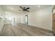 Open concept living room with hardwood floors and recessed lighting at 119 Nat Barber Ave, Gastonia, NC 28052