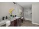 Modern bathroom with double vanity, granite countertops, and a large walk-in shower at 201 School St, High Shoals, NC 28077