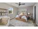 Bright bedroom with a light wood bed frame, neutral decor, and a built-in shelf at 201 School St, High Shoals, NC 28012