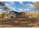 House exterior with side yard at 201 School St, High Shoals, NC 28012