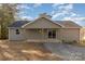 Back exterior view with covered patio at 201 School St, High Shoals, NC 28077