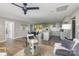 Modern kitchen with gray cabinets, granite countertops, and a large island at 201 School St, High Shoals, NC 28012