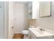 Bathroom with toilet, sink, mirror, and white vanity at 2209 Dale Ave, Lincolnton, NC 28092