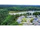 Stunning aerial view of lakeside homes surrounded by lush greenery and serene waters at 25622 Seagull Dr # 645, Lancaster, SC 29720