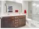 Modern bathroom features double vanity, framed mirrors, granite counters, and a glass shower at 25622 Seagull Dr # 645, Lancaster, SC 29720