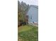 Side view of blue house with deck and fenced yard at 25622 Seagull Dr # 645, Lancaster, SC 29720