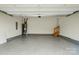 Spacious and clean garage featuring epoxy flooring and a white painted interior at 25622 Seagull Dr # 645, Lancaster, SC 29720