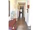 Hallway features hardwood floors with decor and doorways throughout at 25622 Seagull Dr # 645, Lancaster, SC 29720