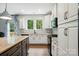 Gourmet kitchen boasts white cabinets, granite countertops, stainless appliances, and a gas cooktop at 25622 Seagull Dr # 645, Lancaster, SC 29720
