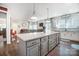 Bright kitchen with granite island, modern pendant lights, and open layout to the living area at 25622 Seagull Dr # 645, Lancaster, SC 29720