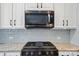 Gourmet kitchen boasts white cabinets, granite countertops, and stainless steel appliances at 25622 Seagull Dr # 645, Lancaster, SC 29720