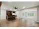 Spacious living room with hardwood floors and a built in wet bar with wooden bar stools at 25622 Seagull Dr # 645, Lancaster, SC 29720