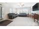 Living room with carpeting, ceiling fan, and lots of natural light at 25622 Seagull Dr # 645, Lancaster, SC 29720