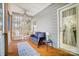 Screened in porch features wood flooring and comfortable outdoor furniture at 25622 Seagull Dr # 645, Lancaster, SC 29720