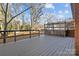 Spacious back deck overlooks a fenced-in backyard with mature trees at 2810 Daleview Dr, Charlotte, NC 28214