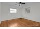 Bright bedroom with hardwood floors and ceiling fan at 2810 Daleview Dr, Charlotte, NC 28214