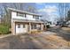 Brick home with attached garage and walkway at 2810 Daleview Dr, Charlotte, NC 28214