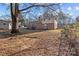 Ranch house exterior with a deck and large backyard at 2810 Daleview Dr, Charlotte, NC 28214