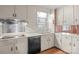 Kitchen with stainless steel appliances and light cabinets at 2810 Daleview Dr, Charlotte, NC 28214