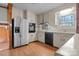 Kitchen features stainless steel appliances and light cabinets at 2810 Daleview Dr, Charlotte, NC 28214