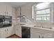 Kitchen with stainless steel appliances and light cabinets at 2810 Daleview Dr, Charlotte, NC 28214