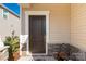 Front door entrance with stone accents and welcome mat at 372 Olympia Way, York, SC 29745