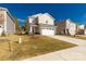 Two-story house with attached garage and driveway at 372 Olympia Way, York, SC 29745