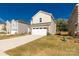 Two-story house with attached garage and driveway at 372 Olympia Way, York, SC 29745