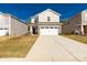 Two-story house with attached garage and driveway at 372 Olympia Way, York, SC 29745