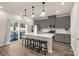 Modern kitchen with gray cabinets, white countertops, and island at 372 Olympia Way, York, SC 29745