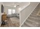 Spacious living room with L-shaped sofa and wood flooring at 372 Olympia Way, York, SC 29745