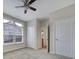 Bedroom features a large window that provides plenty of natural light to illuminate the spacious room at 4919 Polo Gate Blvd, Charlotte, NC 28216