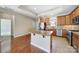 Spacious kitchen features stainless appliances, a granite-topped island, and warm wood cabinetry at 4919 Polo Gate Blvd, Charlotte, NC 28216
