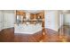 Well-lit kitchen boasts a granite island, stainless steel appliances, and ample cabinet space at 4919 Polo Gate Blvd, Charlotte, NC 28216