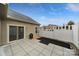 Open patio with privacy fence, offering a secluded outdoor space for relaxation and entertainment at 4919 Polo Gate Blvd, Charlotte, NC 28216