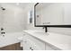 Modern bathroom with white vanity, marble tile, and black accents at 8001 Willhill Rd, Charlotte, NC 28227