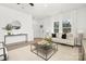 Living Room with contemporary furniture and neutral tones at 8001 Willhill Rd, Charlotte, NC 28227