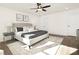 Bright main bedroom with ceiling fan and large windows at 8001 Willhill Rd, Charlotte, NC 28227