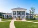 Community clubhouse with columns and a pitched roof at 9744 Inkberry Dr, Gastonia, NC 28056