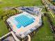 Aerial view of community pool with a pool house and lounge chairs at 9744 Inkberry Dr, Gastonia, NC 28056