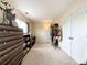 Walk-in closet boasting a full-length mirror, carpet flooring, and clothing racks at 1096 Mountain Laurel Ct, Matthews, NC 28104